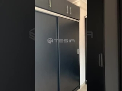 Tesia寝室の家具の戸棚のワードローブのモジュラー木の注文のモダンなデザインの歩行